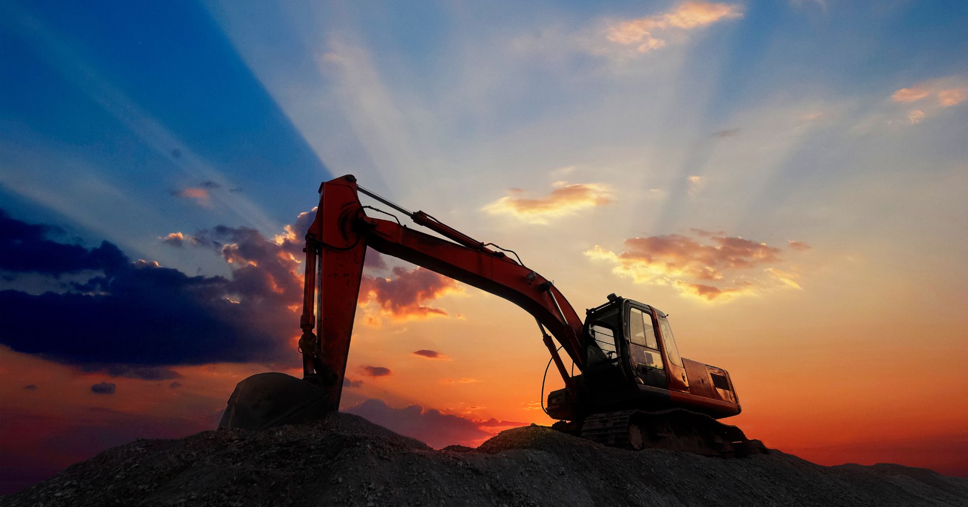 heavy equipment with sunset